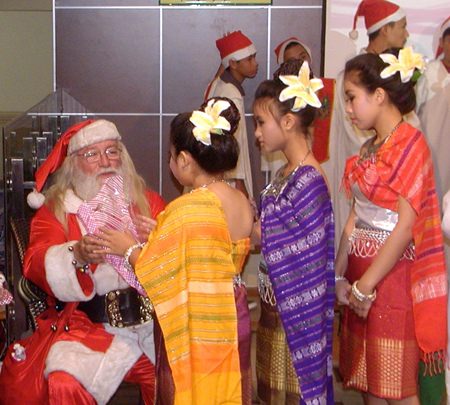 After the carols, Santa gave gifts from PCEC to all the children.