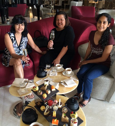 Fine prosecco goes well with high teas as proven by the ladies, Sue of PMTV, Alvi Sinthuvanik and Alisa.