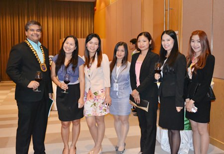 President Tony Malhotra (left) poses with a group of lovely ladies from the travel and tourism business in Pattaya and the eastern Seaboard.