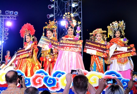  Winners and runners-up of the Miss Chinese Girl contest show off the spoils of victory.