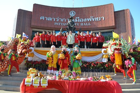 Mayor Itthiphol Kunplome leads city administrators at the beginning of celebrations at city hall.