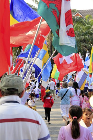Parents, friends and family join in the International Day parade.