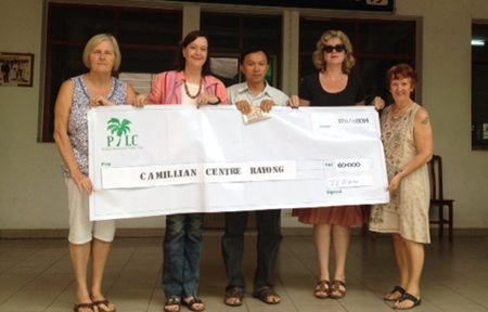Helle Rantsen, Joyce Aldridge, and PILC members donated 60,000 baht to the Camillian Centre.
