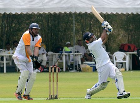 Indorama’s Dhiraj (right) hits out on his way to a brilliant 102.