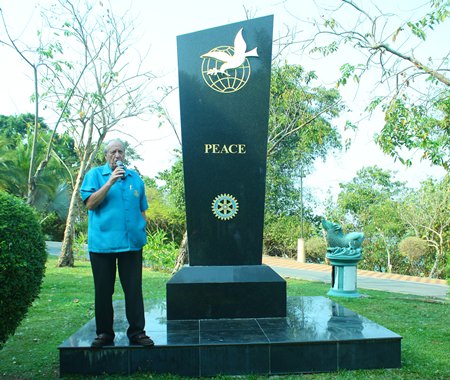 Past President Don Maclachlan narrates the history of the Rotary Peace Monument.