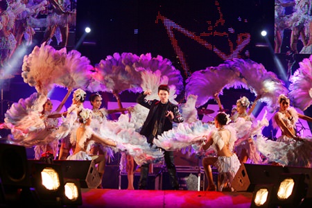 The prince of country, Got Jakapan, surrounded by majestic costumes.