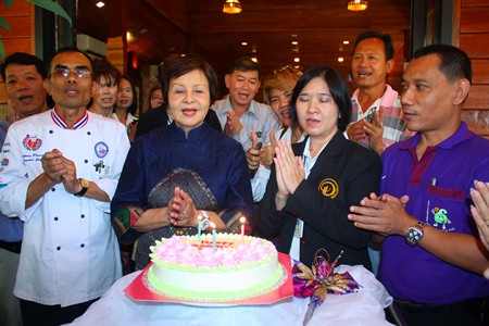 Staff and friends sing Happy Birthday to Diana Group MD Sopin Thappajug (2nd left).