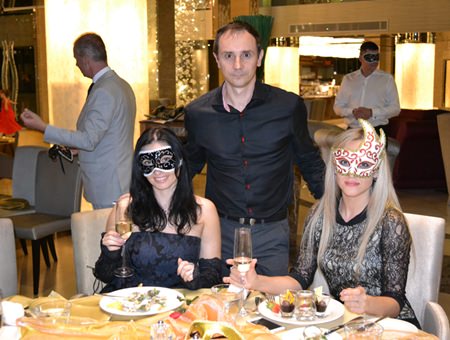 (L to R) Irena and Alex from Russian Real Estate Magazine and Anna from the Tulip Group enjoy the evening fun.