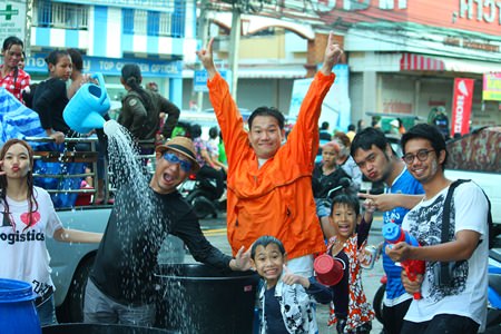 Scorching heat and foreboding clouds couldn’t dampen the enthusiasm of Pattaya-area residents and tourists as they brought the annual Songkran festival to a water-soaked close.  