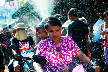 Getting around on a motorbike during Songkran is not always the safest.