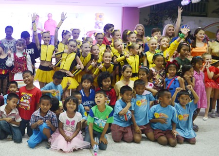 Children from Russia and Thailand, finding common ground in song and dance.