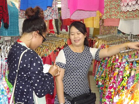 Mayjira Kongkeaw, owner of the Norm Boutique shop, said sales have dropped this year so she cut her prices to 180 baht.