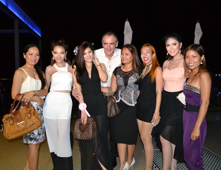 Leonard Stokes (center), Op. Director for A Farang Affair Co. Ltd., poses with the lovely ladies.