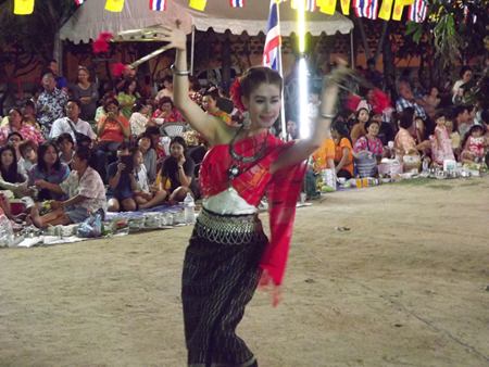 A woman performs the Peefah dance (traditional spiritual dance).