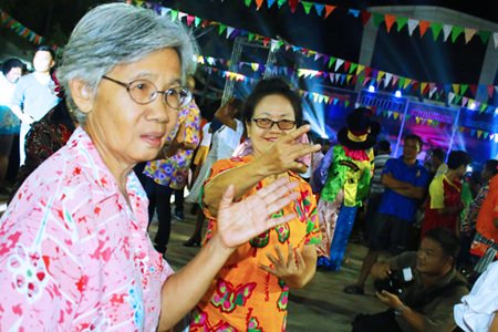 People have fun dancing during the Rice Festival.