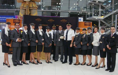 Co-pilot and crew of the Etihad Airways flight departing Bangkok on the day of the Airline’s 10th anniversary, welcome guests at Bangkok’s Suvarnabhumi Airport.