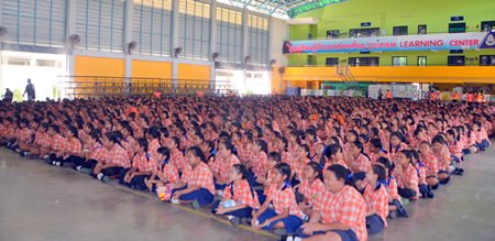 Students from Pattaya School No. 8 listen to speakers teaching the dangers of smoking.