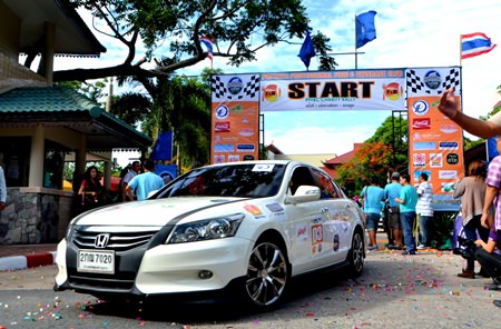 Cars head out from the Diana Garden Resort in North Pattaya at the beginning of the rally.