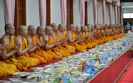 Monks pray to bless Buddhists attending the ceremonies.