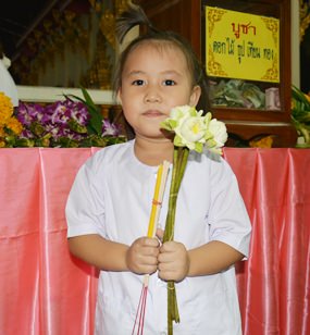 Little Wha-Wha participates in the wien thien ceremony.