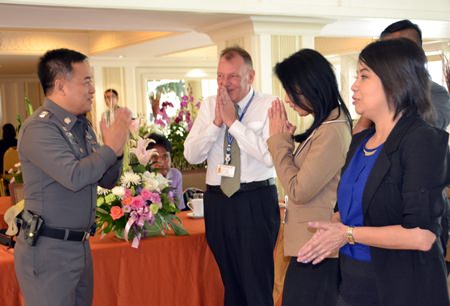 Pol. Col. Suppatee Boonkrong, Deputy Commander of the Chonburi Provincial Police brings hearty good wishes as he is greeted by Pär Kågeby, Senior Consular Officer, Embassy of Sweden, Bangkok and hotel staff.