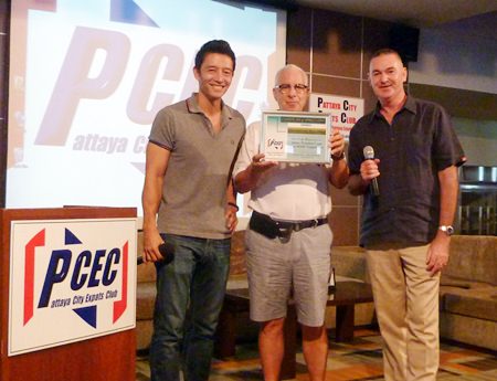 PCEC MC Richard Silverberg presents a certificate of appreciation to Peter and Byron for their special screening of “Clueless?” for the enjoyment of PCEC members and guests.