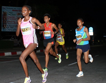 Elite runners pound the Pattaya pavements in the early hours of Sunday morning.