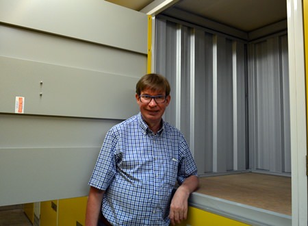 Jan Olav Aamlid, the Managing Director of Pattaya Self Storage demonstrates one of the medium sized lockers.