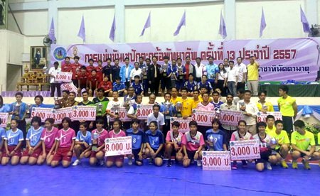 All the teams and tournament officials pose for a group photo during the closing ceremony.