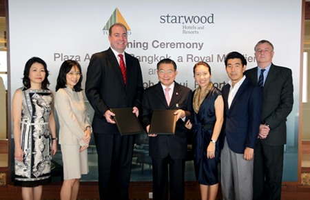 (L to R): June Ng, Regional Director HR, Starwood Hotels & Resorts, Indochina; Serena Lim, Vice President, Acquisitions & Development, Starwood Hotels & Resorts, Asia Pacific; Matthew Fry, Senior Vice President, Acquisitions & Development, Starwood Hotels & Resorts, Asia Pacific; Charoen Sirivadhanabhakdi, Chairman TCC Group; Wallapa Traisorat, President TCC Group; Soammaphat Traisorat, CEO TCC Group; and Georges Baurin, EVP-Asset Management, International Branded Hotels in Thailand, TCC Hotels Group, all pose for a photo during the signing ceremony for the soon to be rebranded Sheraton Samui Resort.