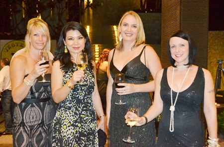 Elegant ladies add glamour to the gala event.