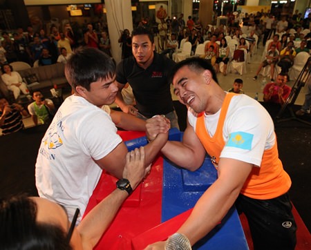 Magzhan Shamyiev defeats Thailand’s Suthiwas Kohsamut for the under 75 kg. crown in this year’s Pattaya International Arm Wrestling Championship.  Shamyiev was one of three Kazakhstani brothers who won all 3 divisions. 