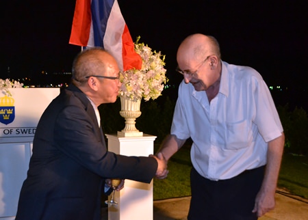 Consul Chatchawal greets John A. Haerum, a Norwegian long term resident of Pattaya.