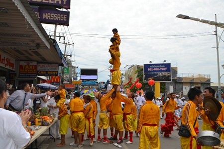 Chinese acrobats, always an exciting edition to the festival, perform on Beach Road.