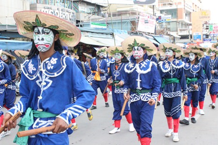 Eng-Ko fighters join the parade through town before showing off their fighting skills.
