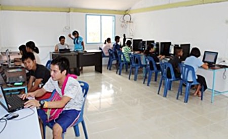 Students using the new computer room funded through Regents Gold Fish Program.