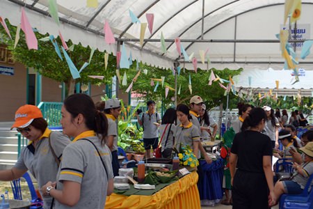 Hosts and guests enjoy a beautiful meal prepared by guests and staff.