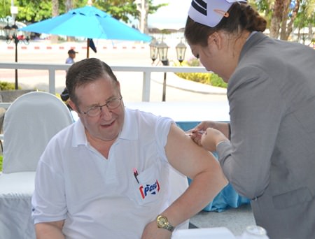 Club member David Garmaise is one about 60 members and guests that took the opportunity to get their flu shots done during the PCEC meeting.
