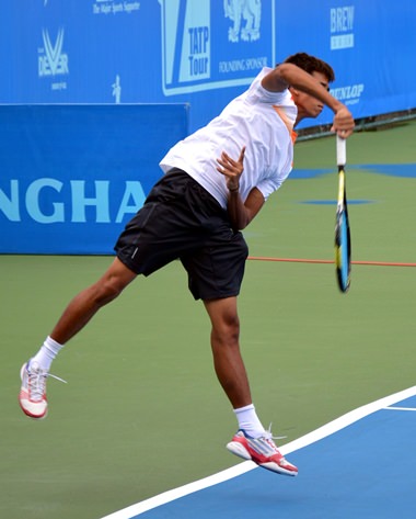 Burapharitta serves to Warit Sornbutnark in the deciding set of the men’s final.