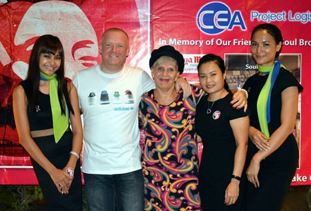 Pattaya Soul Club founders Earl Brown (2nd left) and Eva Johnson (centre) pose with the Riviera Group girls at the anniversary “Souled Out” party on November 8 at the Access Inn, Pattaya.