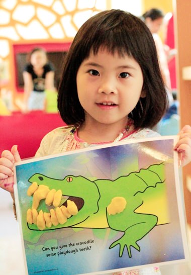 One of the young guests with her masterpiece.