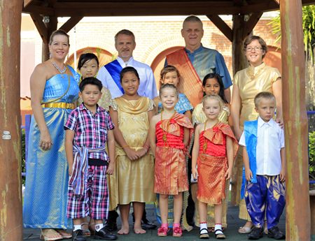 Staff and students in traditional Thai dress.