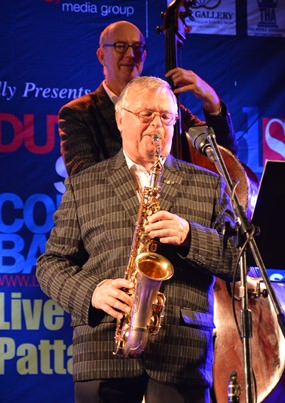 Band director Bob Kaper plays his heart out on saxophone.