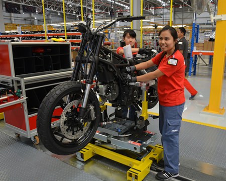 Ducati employees show how they produce a Ducati Motorbike.
