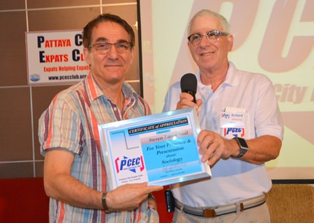 MC Richard Silverberg presents the PCEC Certificate of Appreciation to Steven Lance Stoll for his fast-paced and at times provocative presentation.