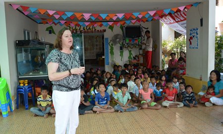 PILC President Helle Rantsen explains what the Sanuk Day Care Center does for local children.