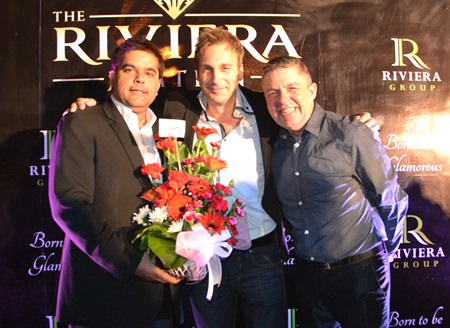 (L to R) Tony Malhotra, Deputy MD of the Pattaya Mail Media Group, congratulates Winston Gale of Riviera Group, with Paul Strachan, Production Manager of PMTV.