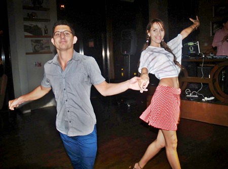 Couples salsa the night away at the Red & White Valentines Party hosted by Holiday Inn’s Havana Bar.