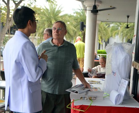 After his presentation, Dr. Arnon Suwanpasak takes time to converse with members and guests. Here he converses with PCEC Club member David Meador.