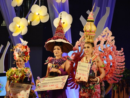 Winners in the flowered dress contest add pulchritude and fragrance to the show.